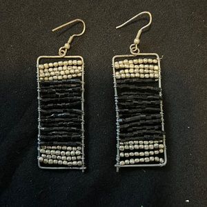 Black and Silver color pierced earrings